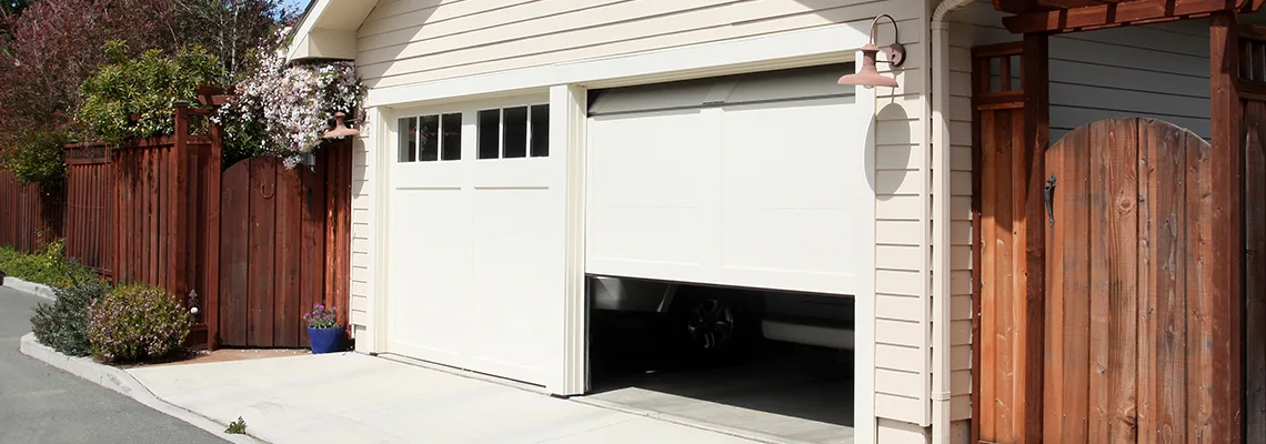 Fix Metal Garage Door Jerking in New Lenox, Illinois